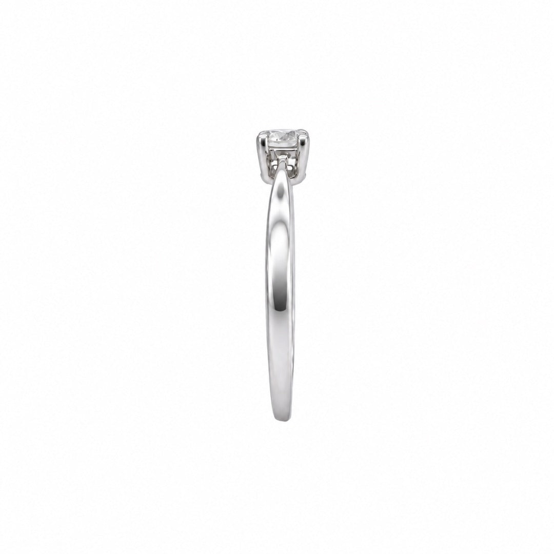 18ct white gold four claw solitaire engagement ring with slim 1.5mm band, side view